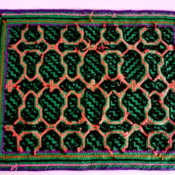 Hand embroidered shipibo altar design multicolored patterns Amazon jungle